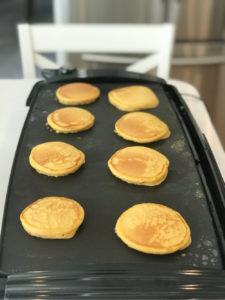pumpkin pancakes on griddle